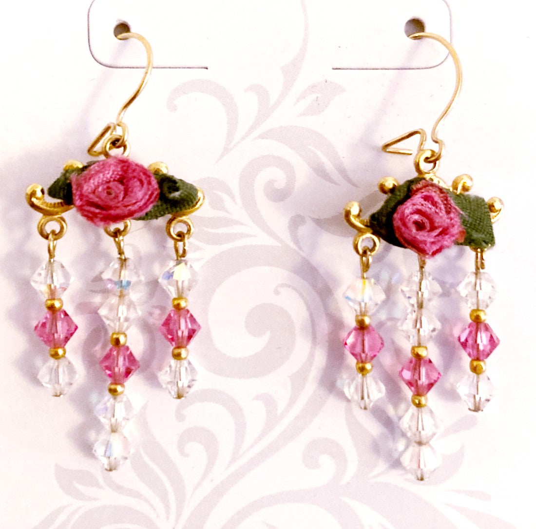 Fuchsia and Aurora Borealis Austrian Crystal with hand made ribbon roses, gold tones and 24ktgf ear wires.