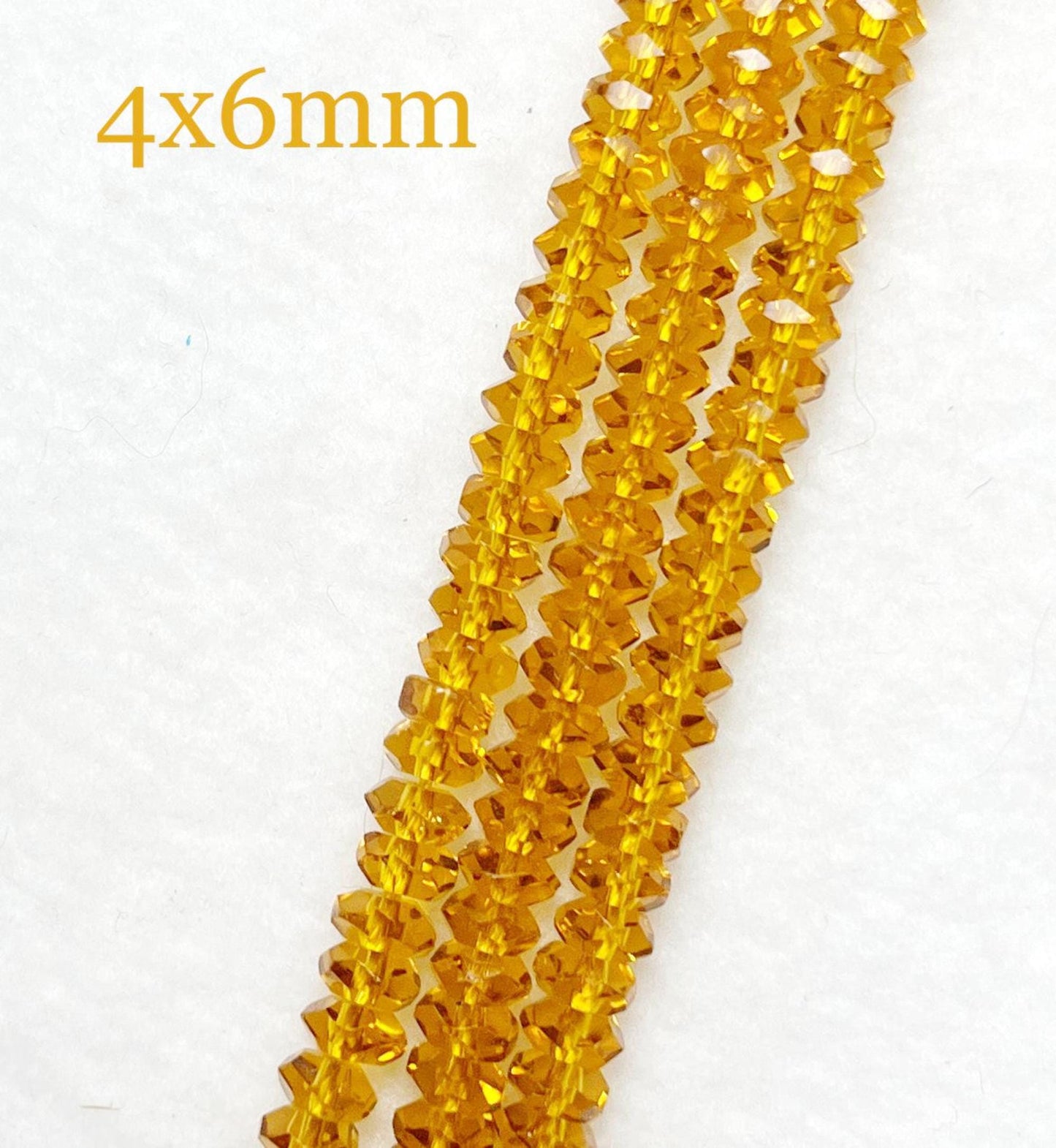 New 36 RICH AMBER Highly Faceted Glass Crystal Beads 4x6mm Gorgeous