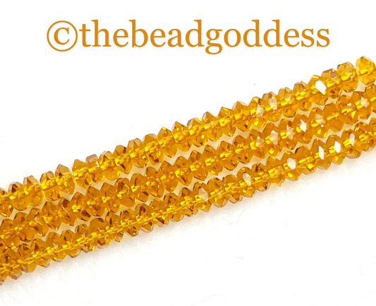 New 36 RICH AMBER Highly Faceted Glass Crystal Beads 4x6mm Gorgeous